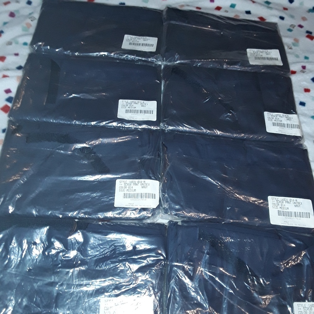 Bundle of 8 navy blue scrub pants medium